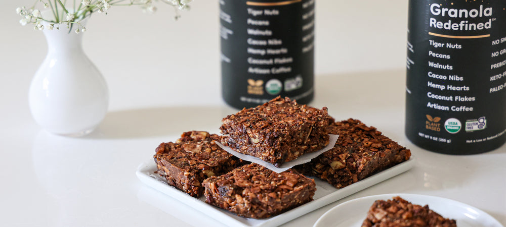 A stack of flavorful breakfast bars made using Struesli's Cacao + Coffee granola.