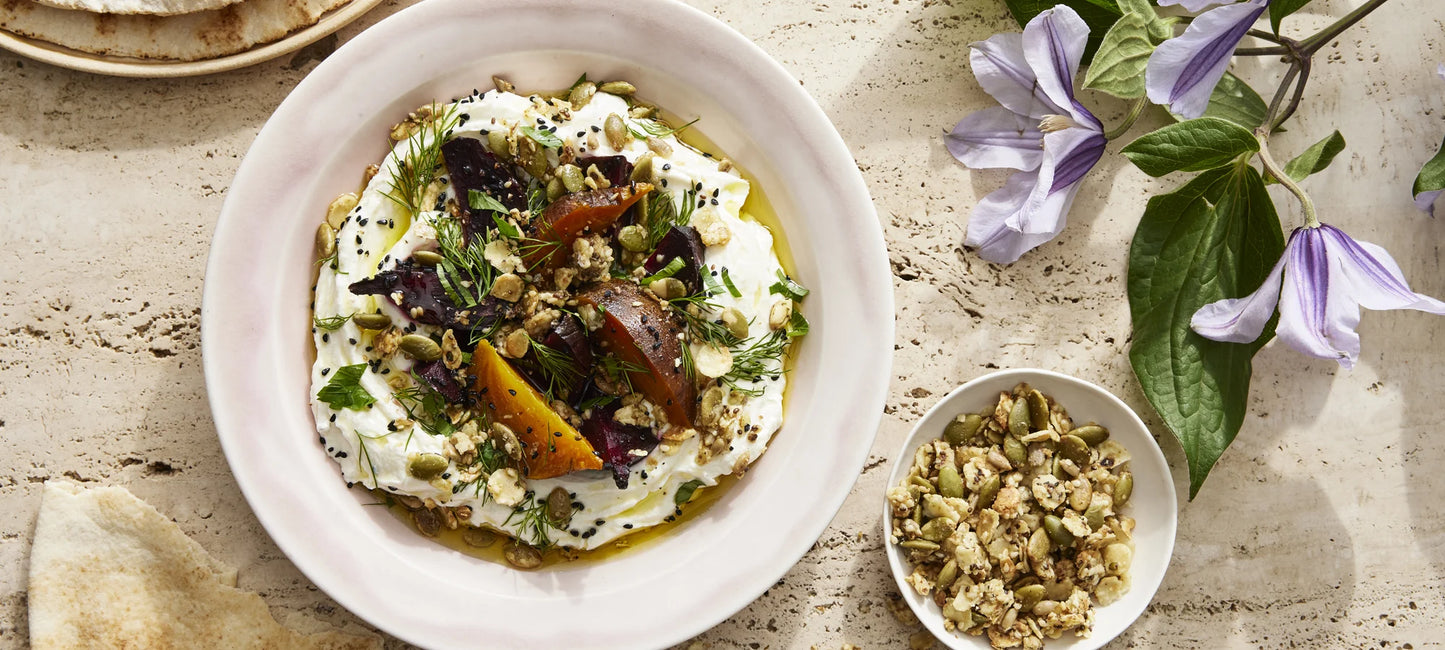 A flavorful bowl of labneh, beets and herbs topped with the satisfying crunch of Struesli's nut-free granola.