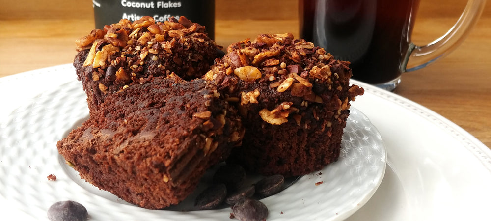 Double Chocolate Banana Muffins with Struesli cacao + coffee granola for rich flavor.