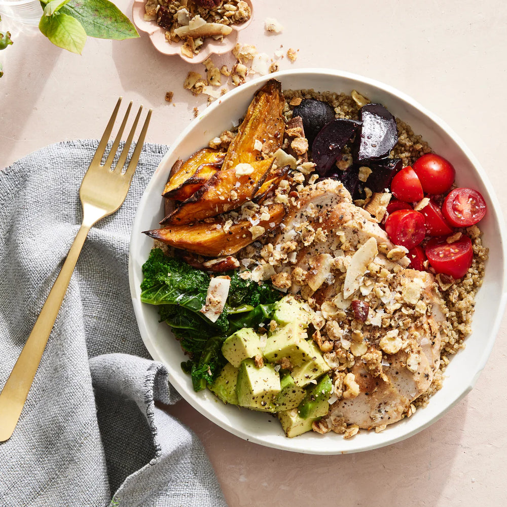 A savory bowl of quinoa, veggies and crunchy Struesli granola.