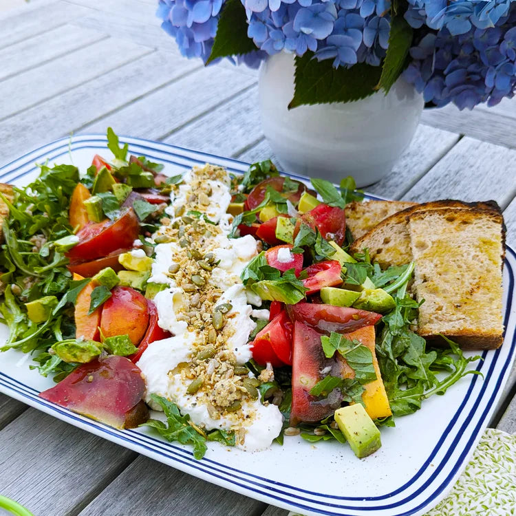 Heirloom tomato salad with savory granola.
