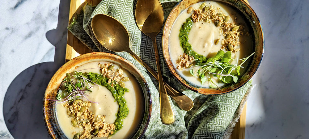 Vegan Cauliflower Soup Topped With Basil Pesto and Savory Granola