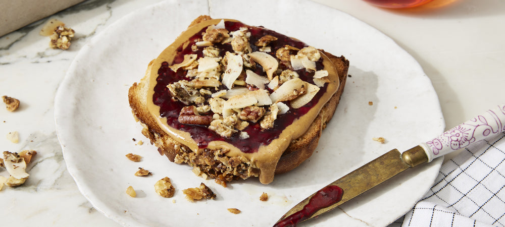 A quick nut-butter toast with jam and Struesli's satisfying granola.