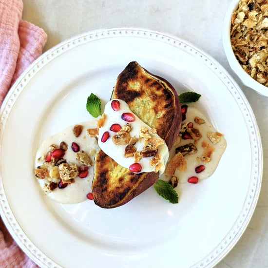 Caramelized japanese sweet potato with coconut sauce and granola.