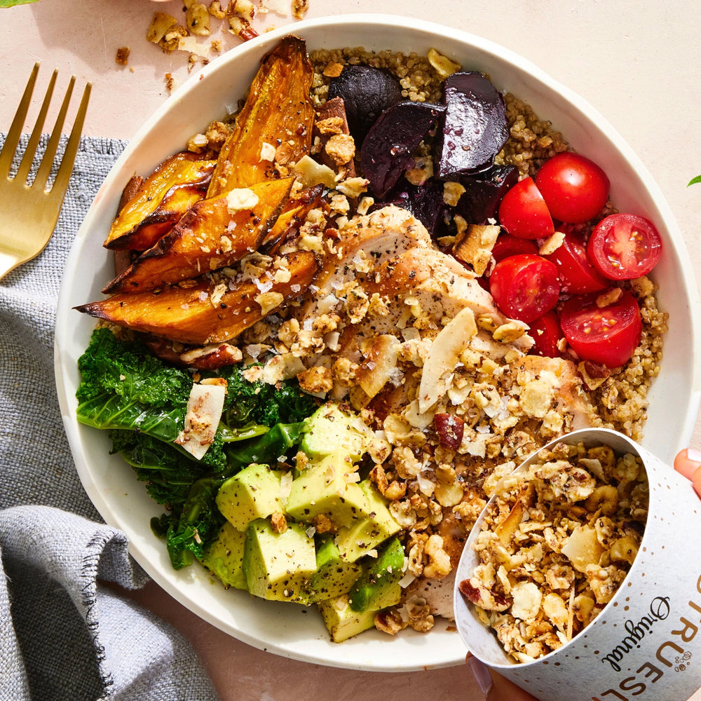 Struesli Original Granola sprinkled over a nourishing lunch bowl.