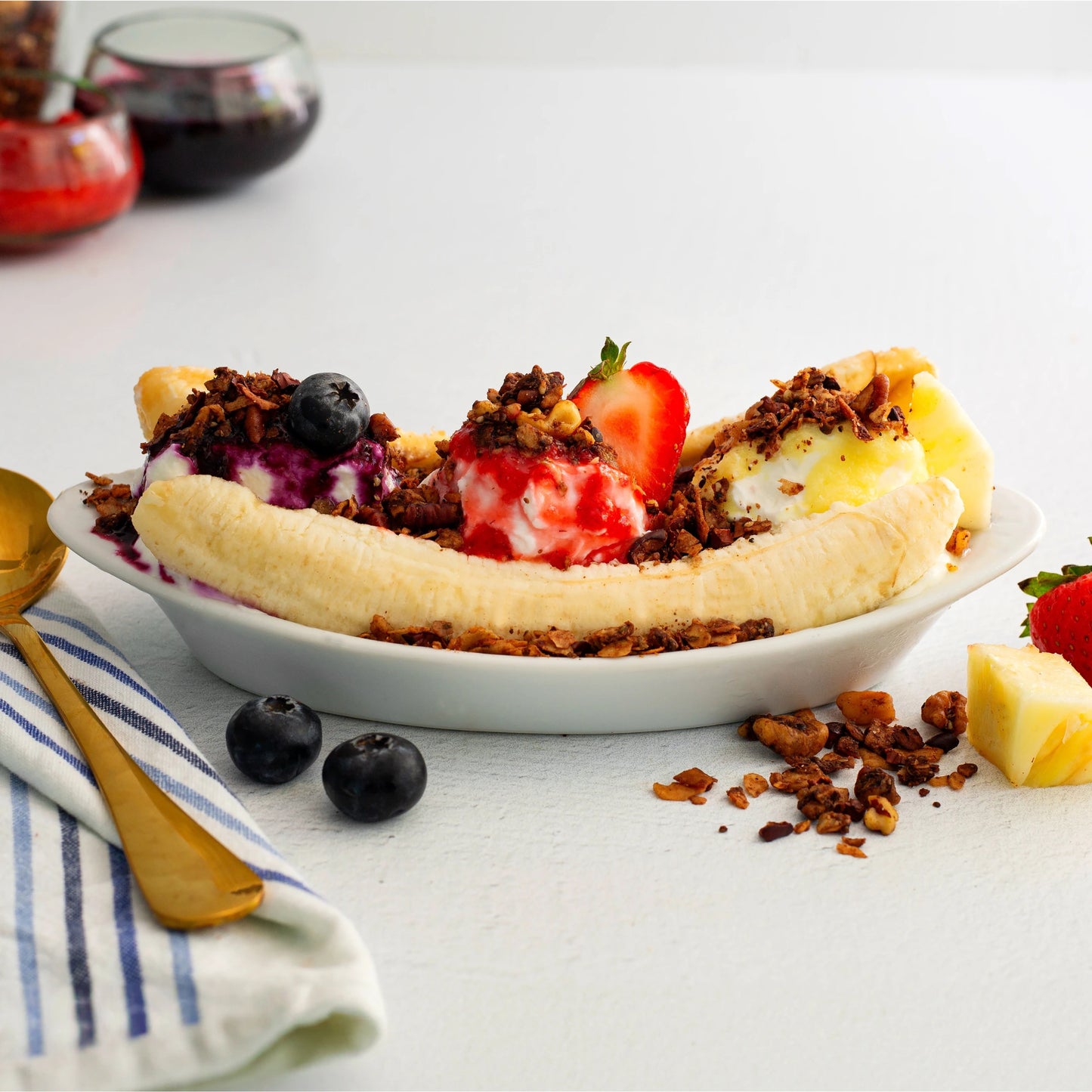 Healthy Banana Split With Fruit Sauce And Struesli Cacao & Coffee Granola