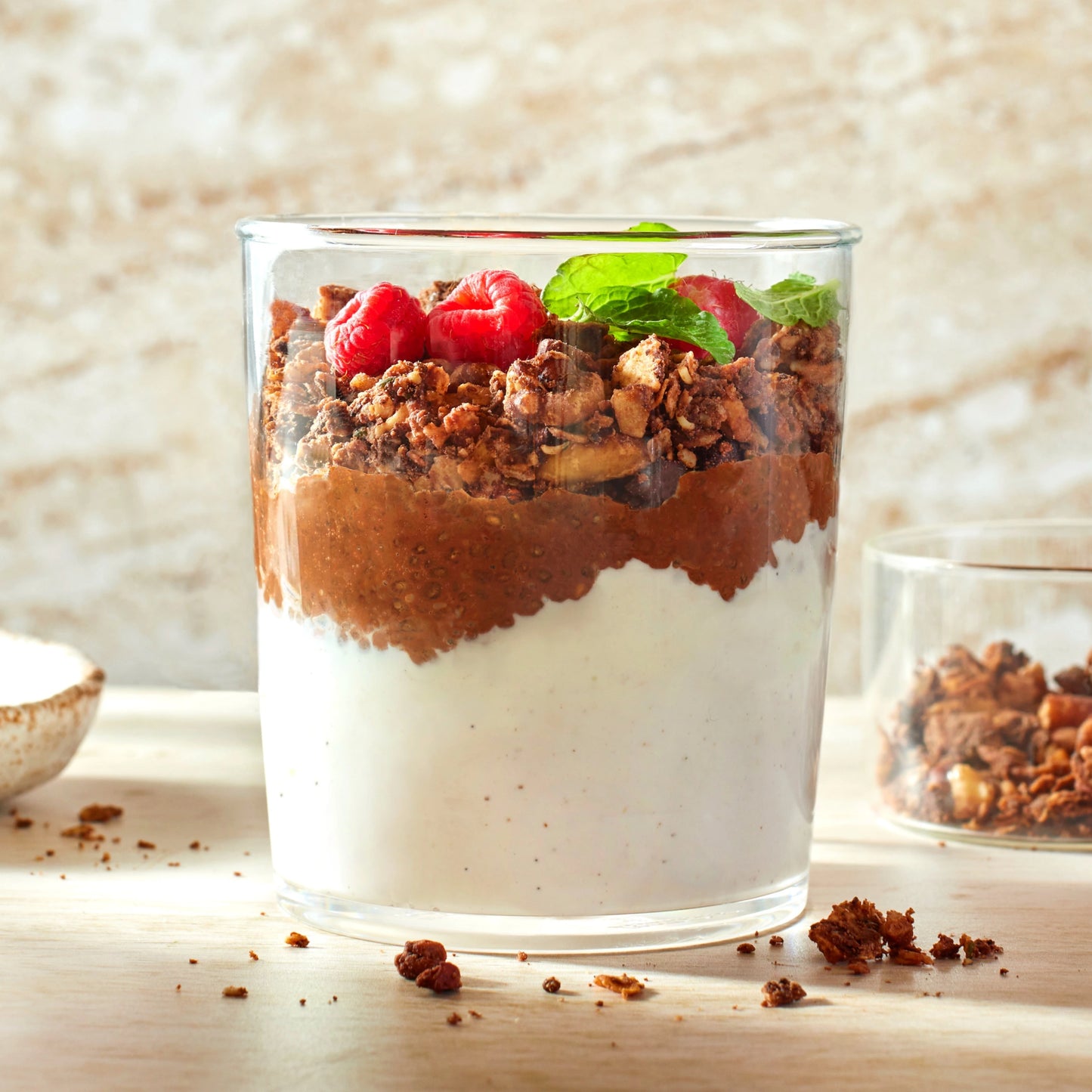 Layered chocolate chia pudding with Struesli Cacao + Coffee granola.