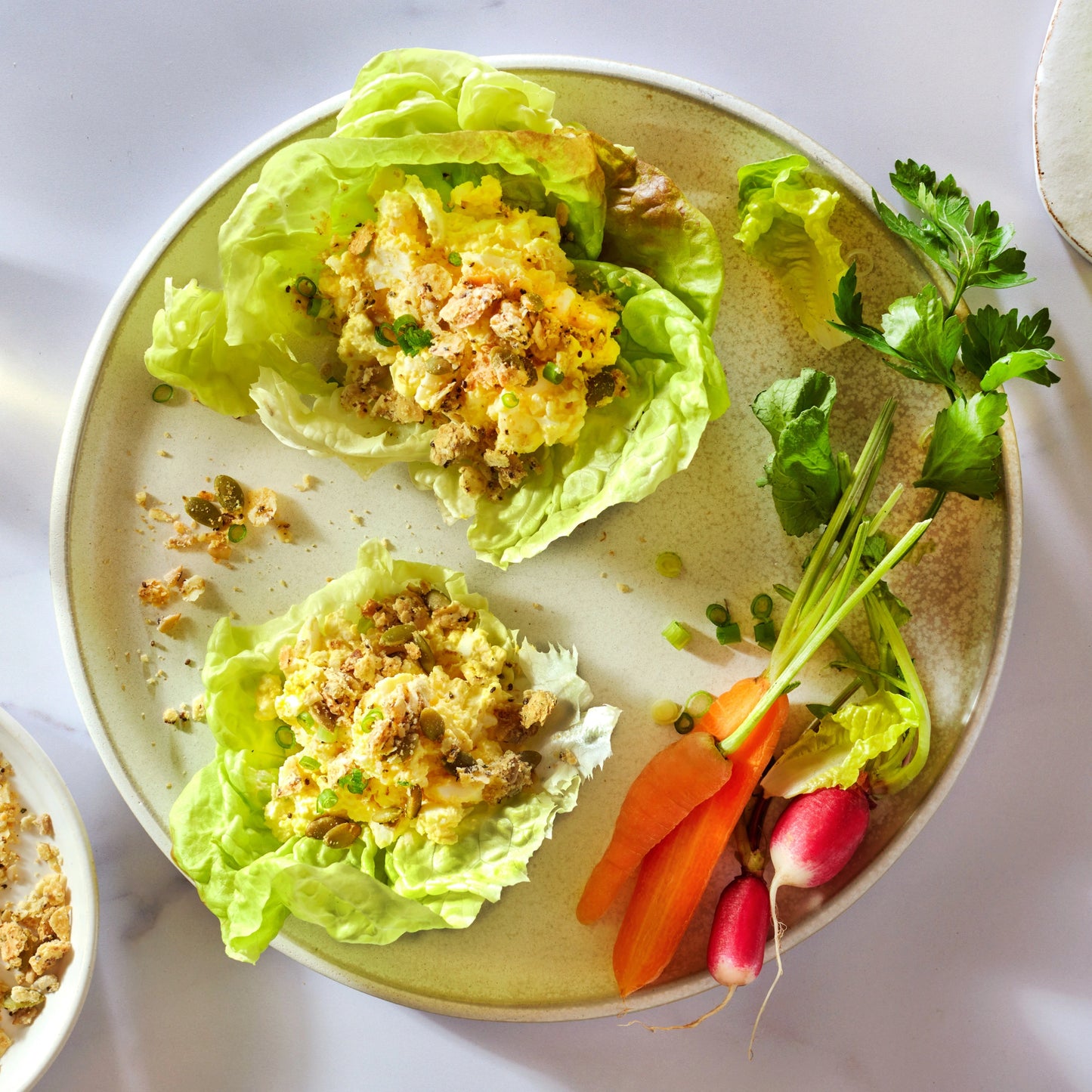 Salad wraps with egg salad and Struesli savory granola topping.