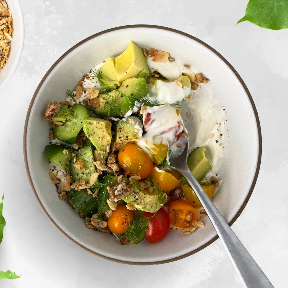 A savory yogurt bowl topped with Struesli grain-free granola