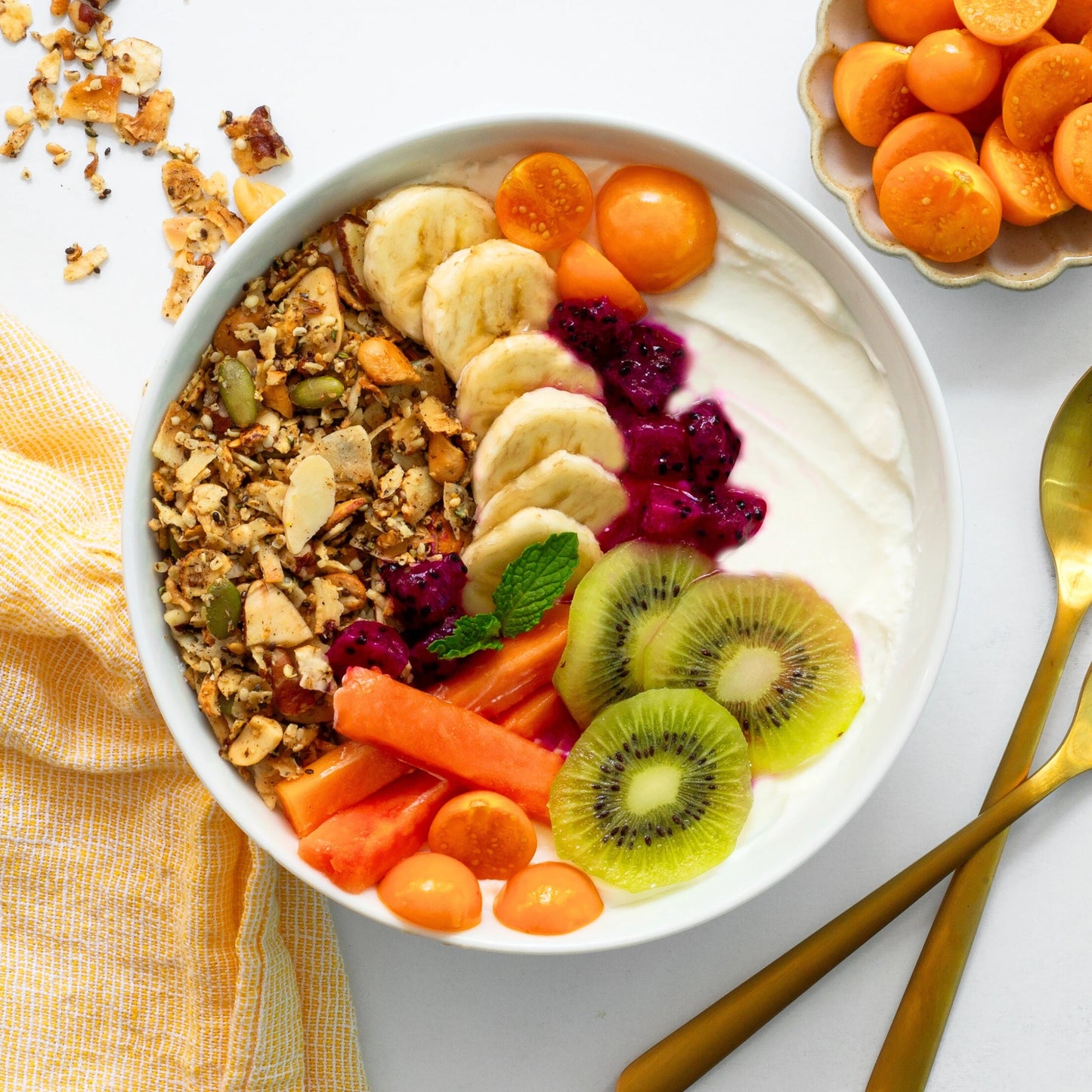 Tropical Yogurt Bowl With Cashew And Vanilla Granola
